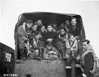 2 crews from 433 Sqdrn Dec 2 1944 being driven to their planes for an op
